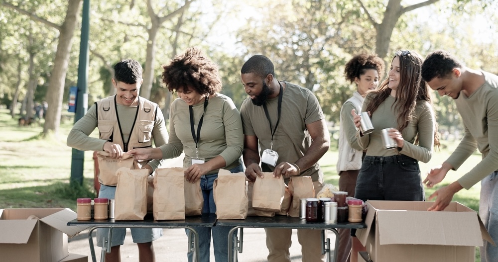 Group of volunteers packing food packs